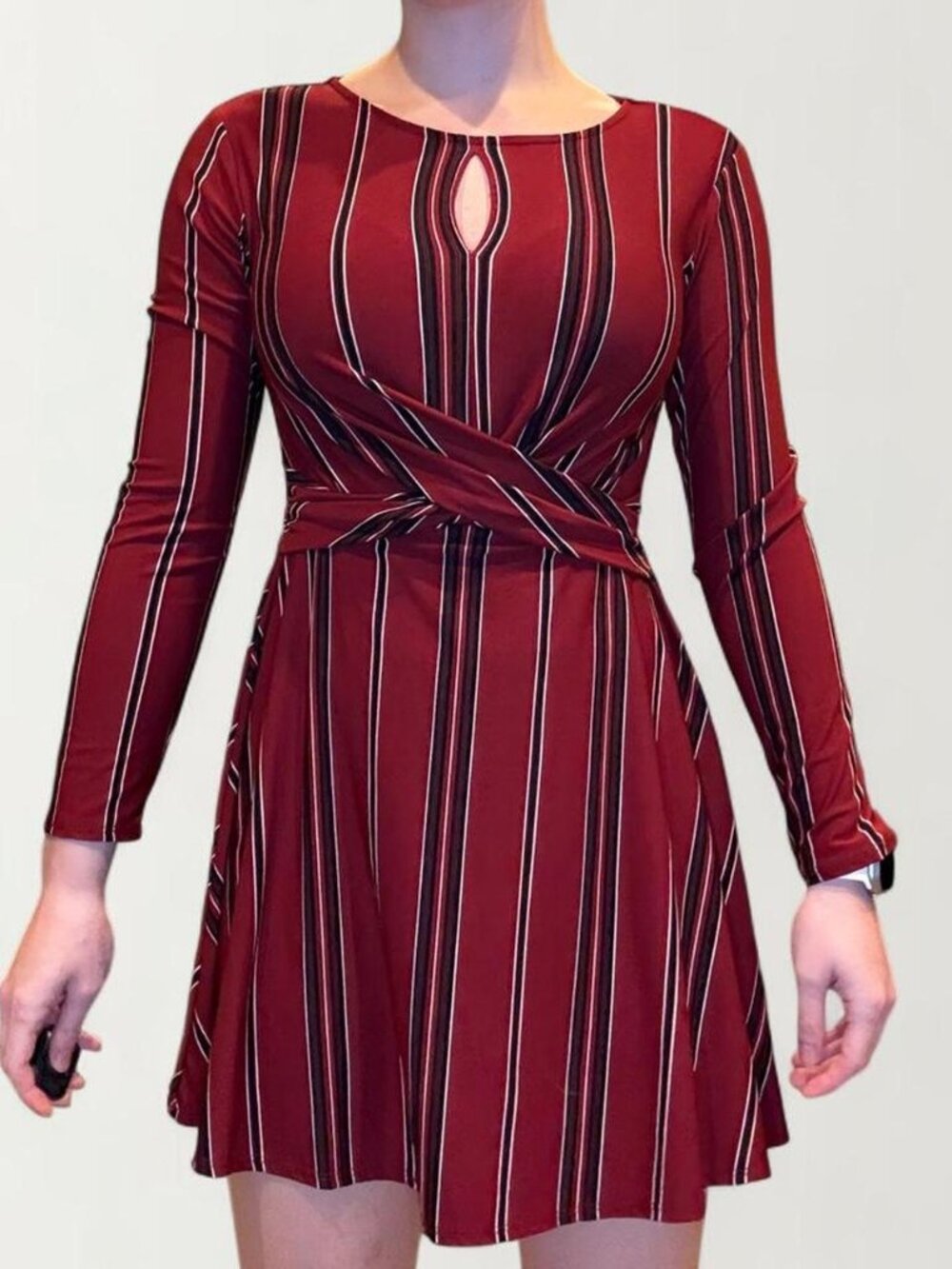 Burgundy, black, and white vertical striped dress with keyhole detail in size S